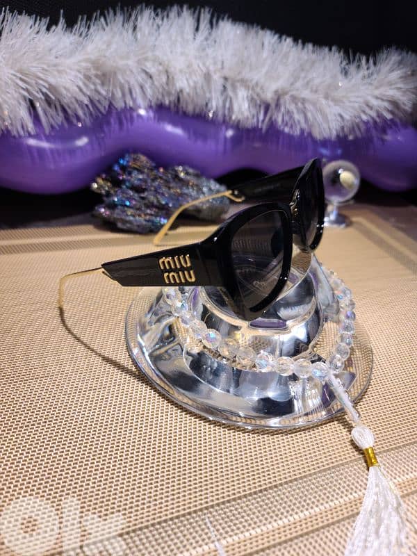 MIU MIU BLACK and GOLD luxury  sunglasses 0
