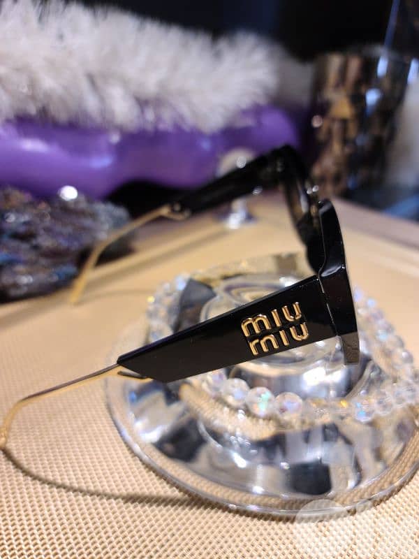 MIU MIU BLACK and GOLD luxury  sunglasses 1