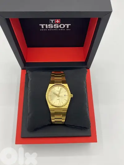 Tissot prx gold