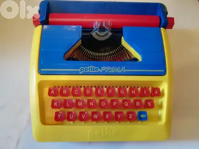 Vintage kids toy typewriter by petite prima made in England in box