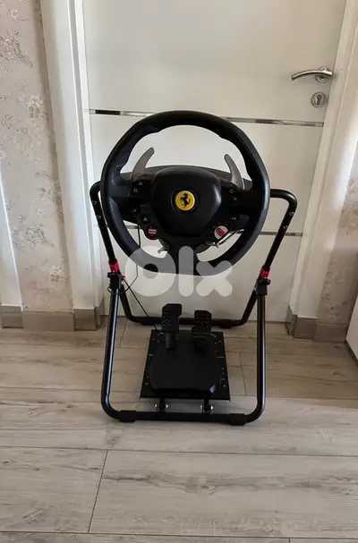 THRUSTMASTER 180 steering wheel + complete metal stand (make ur offer)