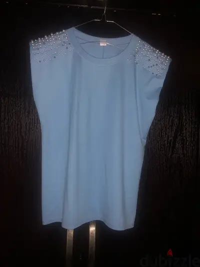 blue top with pearls
