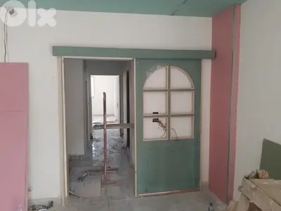 كافة انواع الأبواب الخشبية
