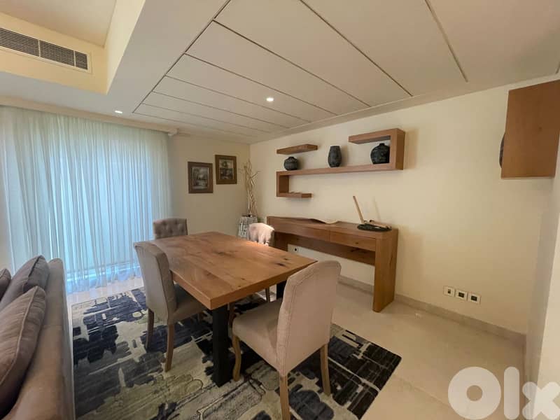 Apartment for sale at the Kempinski Summerland with private garden 1