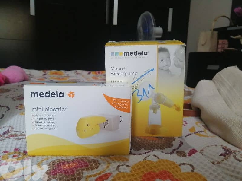 breastfeeding  and a baby monitor 2