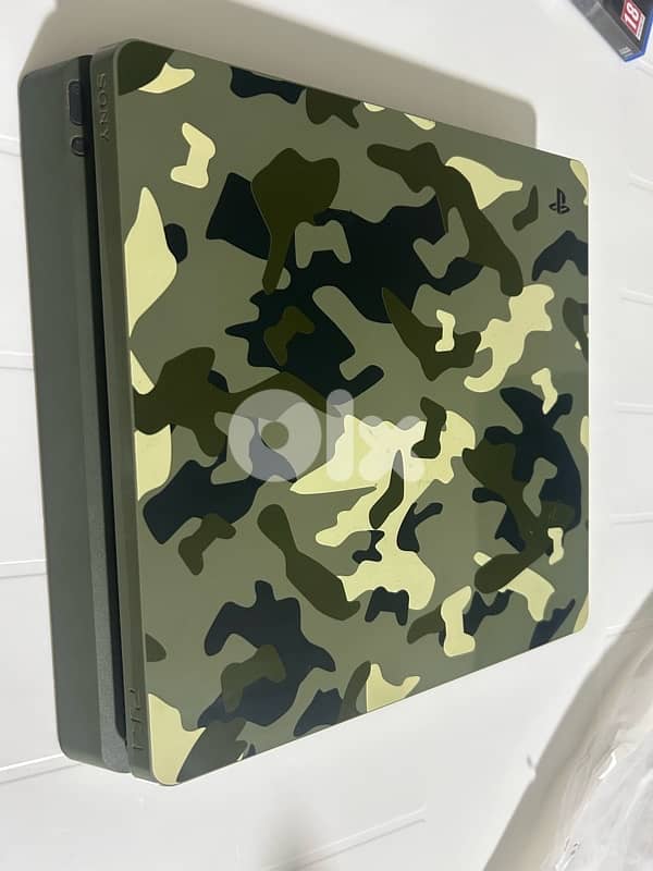 ps4 slim 1tb + 4cds 2