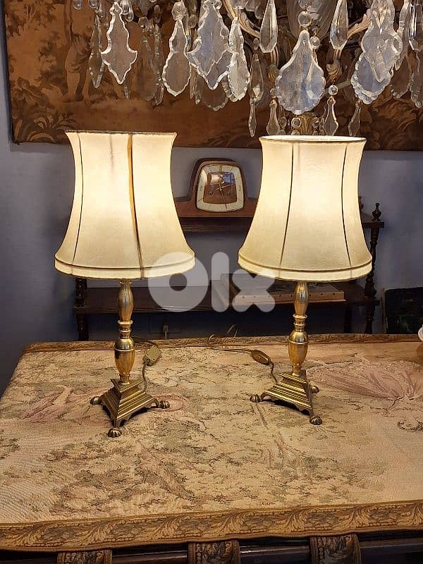 pair of bronze and leather lamps 0