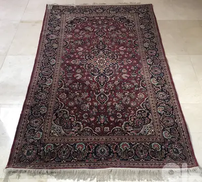 Handknotted Persian Kashan carpet