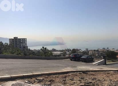 1003 m2 land+sea/mountain view 4sale in Adma - أرض للبيع في أدما