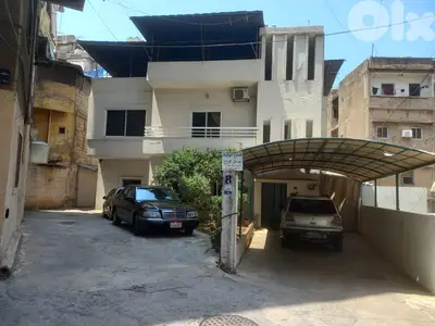 Land For Sale in Sin El Fil With a Whole Building أرض للبيع في