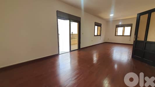 SPACIOUS APT LOCATED IN AIN EL REMANEH , BADARO SIDE (BDA-164)
