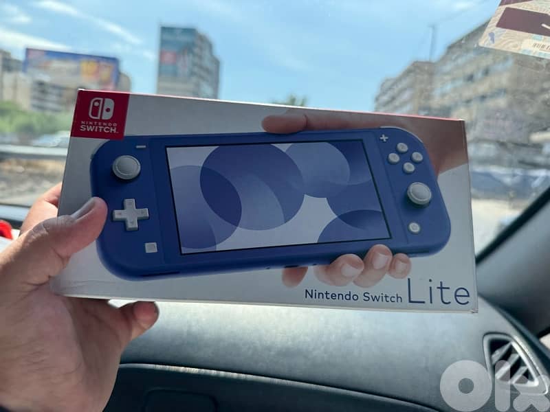 Nintendo Switch Lite + GTA 0