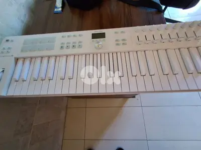 white arturia 49 keys midi controller