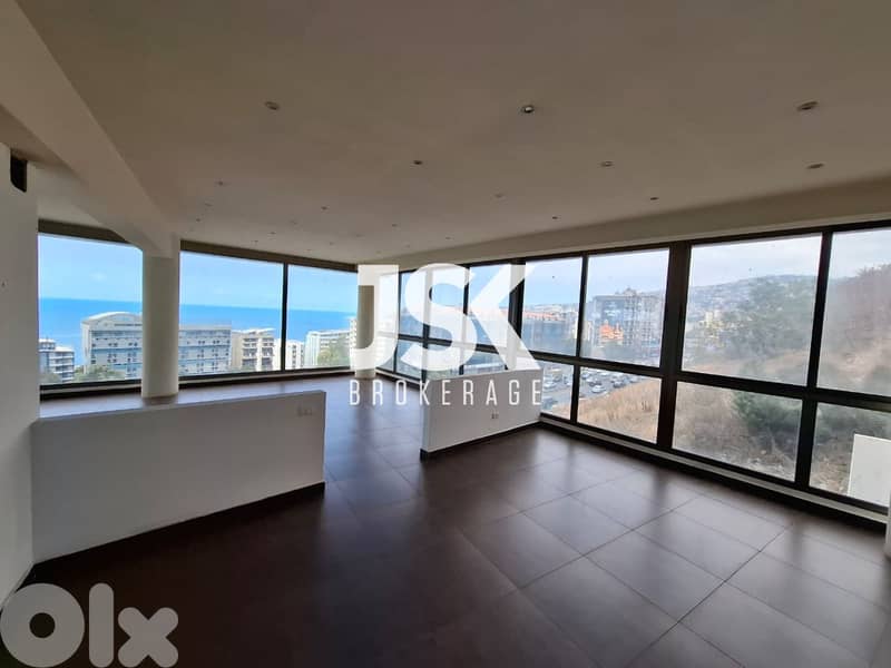 L18779-Spacious Office With Seaview For Rent in Haret Sakher 0