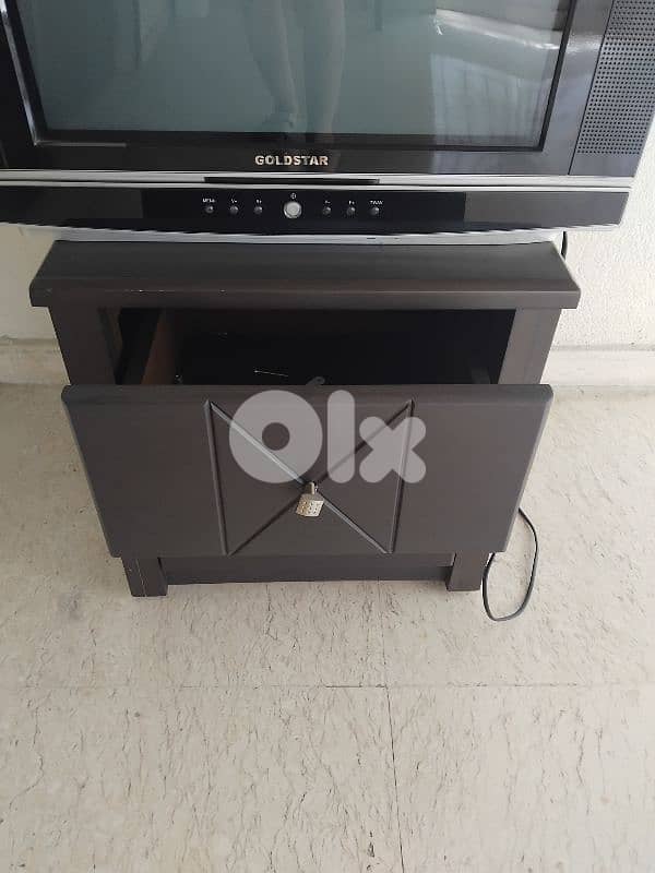brown wooden nightstand 0