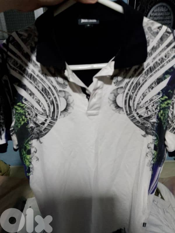 White and black T-shirt. 0