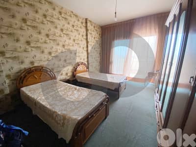 Open city/partial sea view in Tariq el Jdideh/طريق الجديدةREF#YJ124784