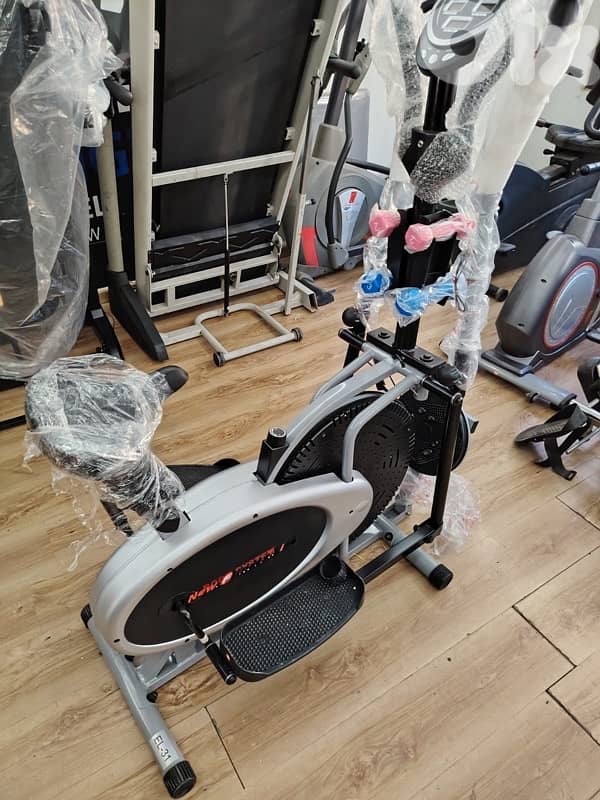 elliptical bike like new with dumbells and twister 1