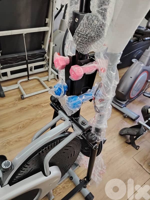 elliptical bike like new with dumbells and twister 2