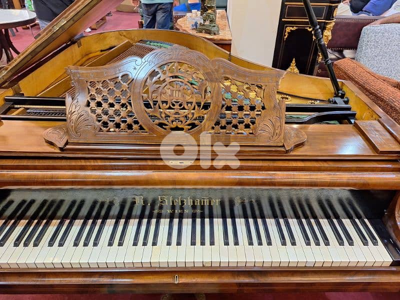 piano baby grand by Vienna tuning warranty 1