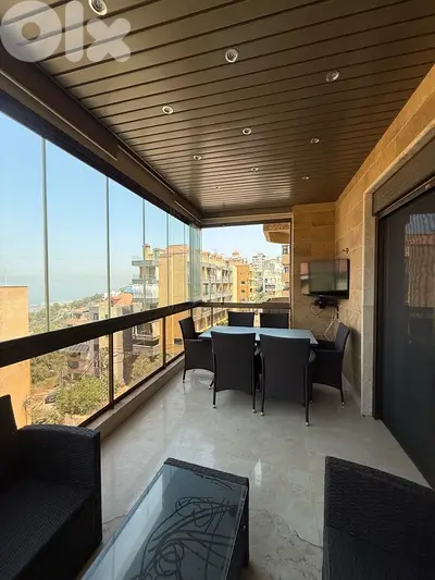 Semi furnished apartment for rent in Bsalim with partial view.