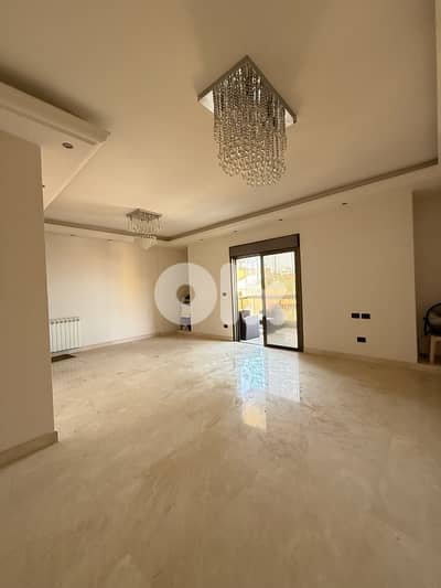 Semi furnished apartment for rent in Bsalim with partial view.