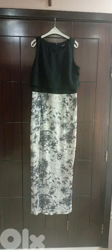 Long black unique dress with a special sparkly design.