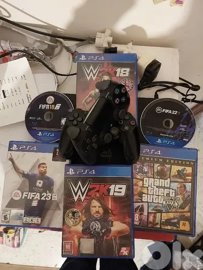 ps4 SLIM ma3 2 controllers, fifa 23,ea fc 24, WWE 2K19, WWE 2K18,GTA 5