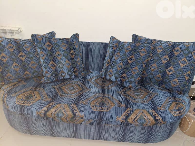 one sofa bed + 2 chairs fer forgé 1 extra sofa,3 tables good condition 3