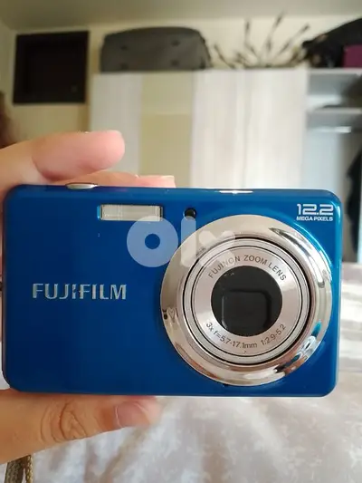 camera used no charger with me might also need batteries
