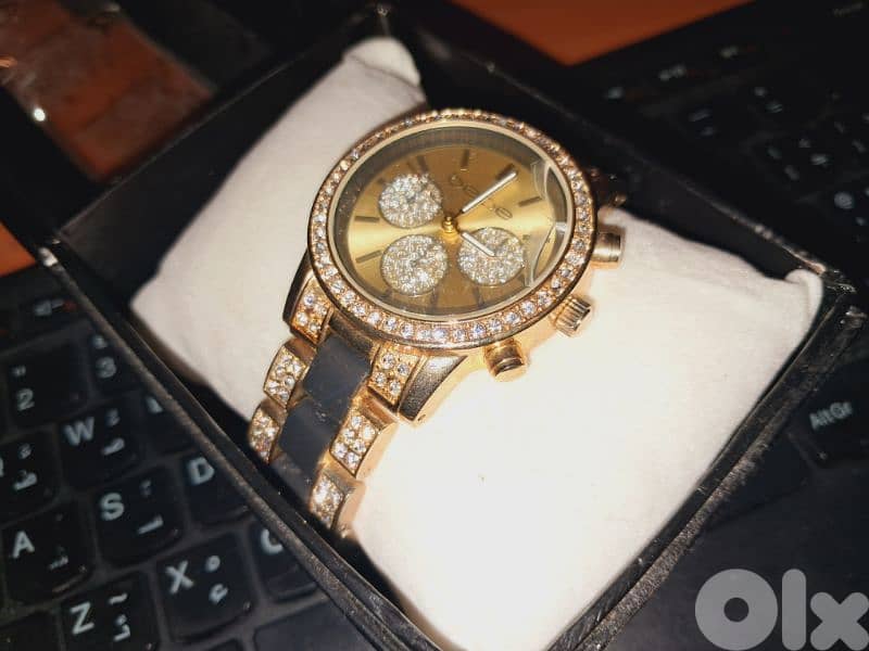 Original bebe Golden Watch 1