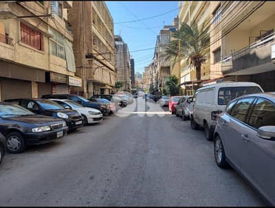 802m2 building-Prime Location-4sale in Ain El Remaneh/Wide main street