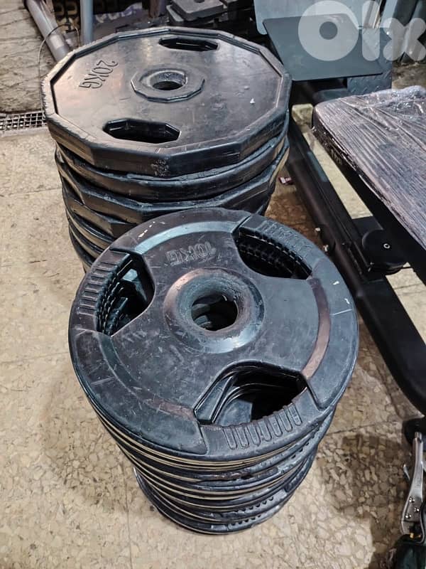 Plate olympic used like new lkilo b 1.5$ 2