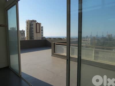Spacious penthouse with terrace & open sea view for sale in Achrafieh