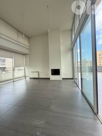 Spacious penthouse with terrace & open sea view for sale in Achrafieh