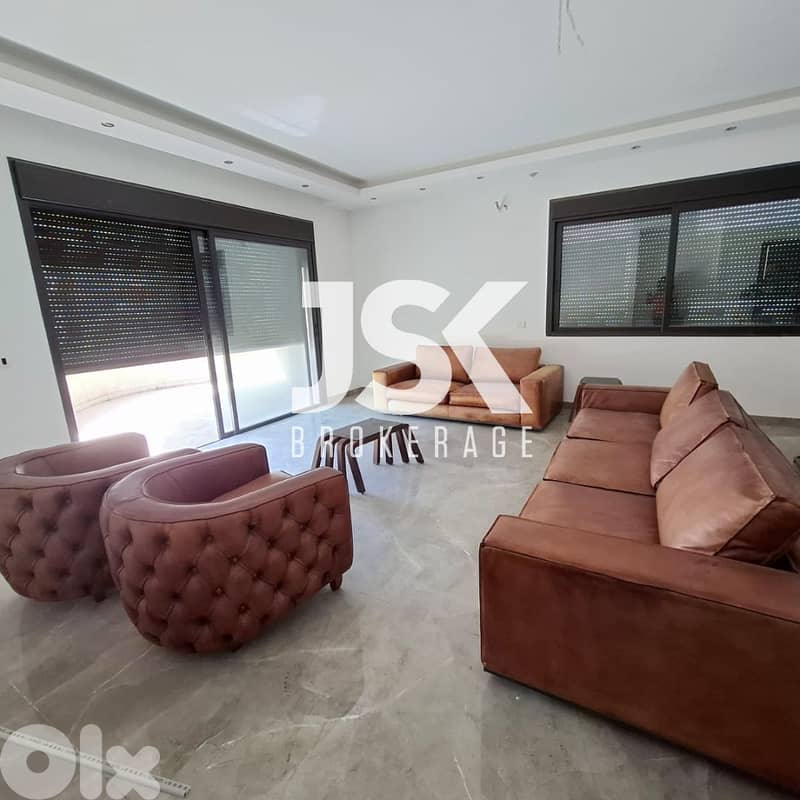 L19027 - Spacious Semi-Furnished Modern Apartment For Sale in Adonis 0