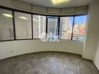 Minimalistic office with balcony and parking prime location achrafieh