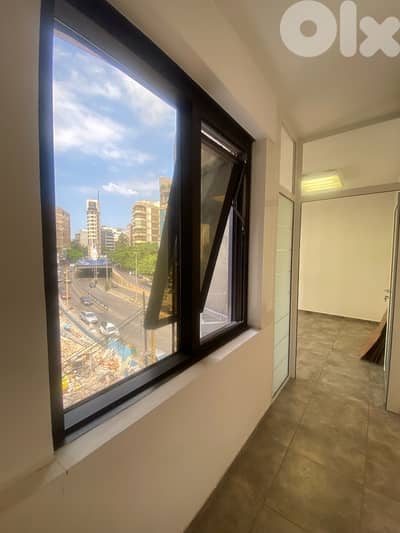 Minimalistic office with balcony and parking prime location achrafieh