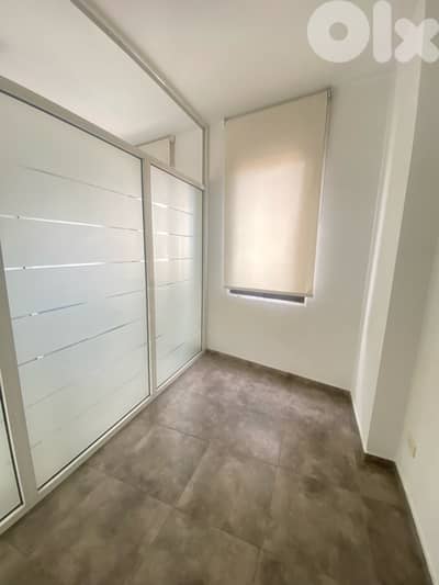 Minimalistic office with balcony and parking prime location achrafieh