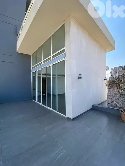 High ceiling loft with large terrace and sea view High ceiling loft with large terrace and sea view