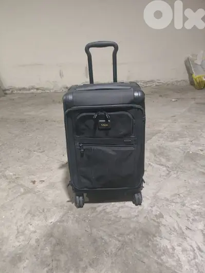 Tumi International Access 4 Wheeled Carry on Alpha