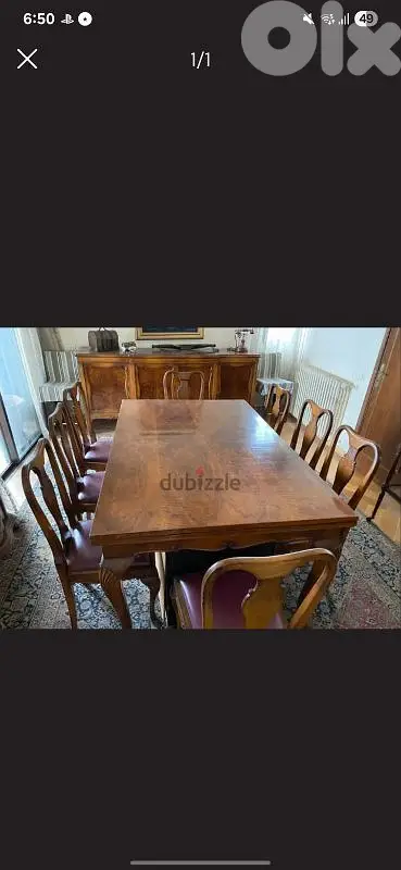 Antique Queen Ann Dining Room set with a dresser and 8 chairs.