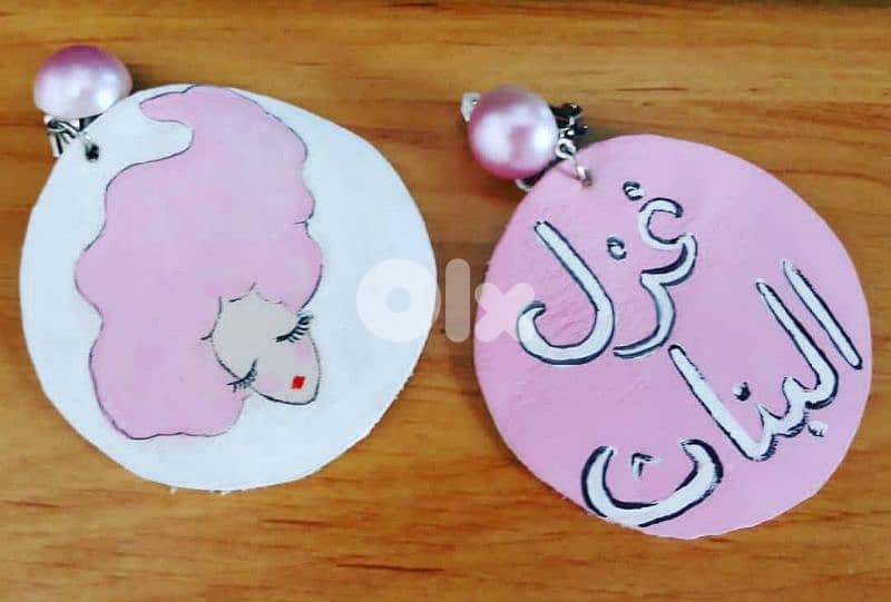 Hand painted ghazel al banat leather earrings. 0