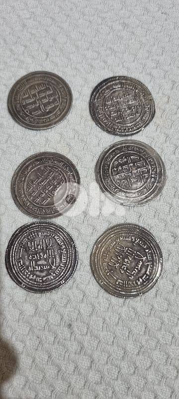 6 different Islamic silver coins 0