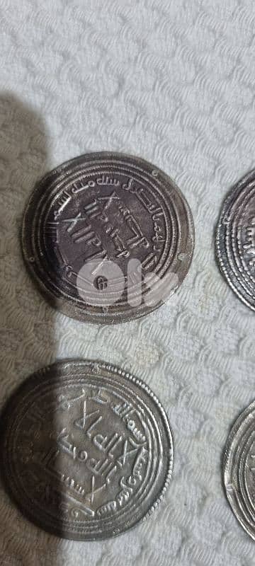 6 different Islamic silver coins 9