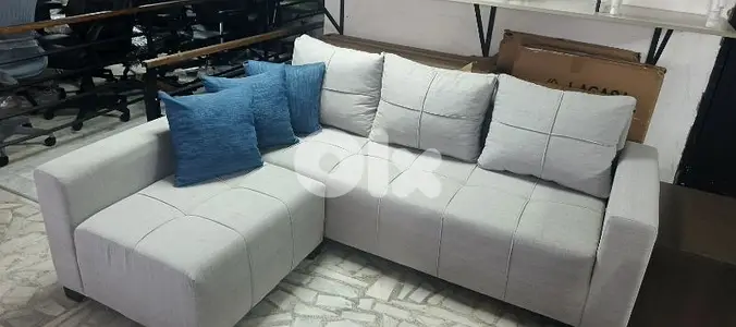 sofa with pouf. زاوية دعاية