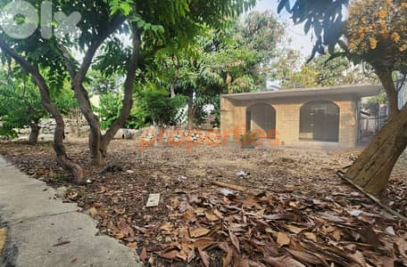 Land with house and shops for sale in Aamchit – Jbeil – CPJMH20