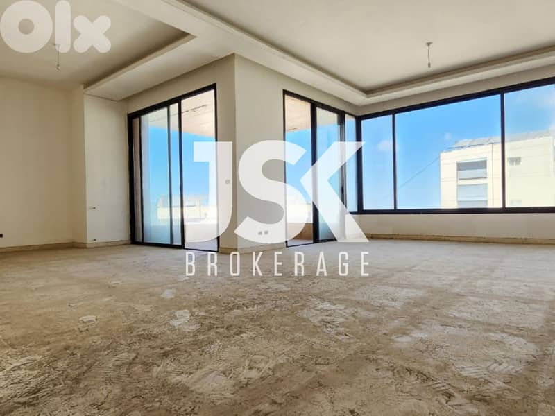 L19324 - Spacious Apartment With Rooftop For Sale in Hazmieh 0