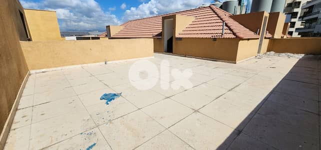L19324 - Spacious Apartment With Rooftop For Sale in Hazmieh