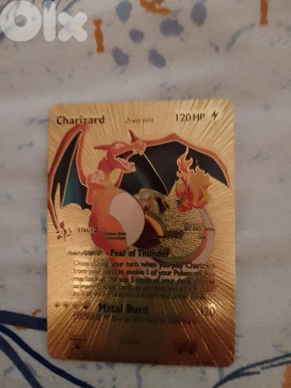 Charizard pokemon golden card. 0